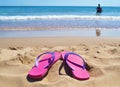 Pink flip flops at a greek beach - greek summer destination Royalty Free Stock Photo