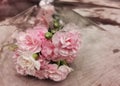 pink flower bouquet on wooden background