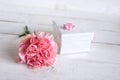 Pink flower decoration with a gift