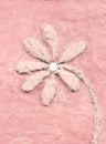 Pink flower relief on wall