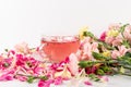 Pink Flower Tea with Carnation Petals. Hot Rose Drink in Glass Cup Royalty Free Stock Photo