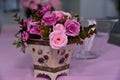 Pink flower vase on the table Royalty Free Stock Photo