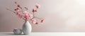 A pink flowerfilled vase graces a table as a beautiful houseplant artifact Royalty Free Stock Photo