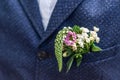 Pink flowers boutonniere flower groom wedding coat with vest Royalty Free Stock Photo