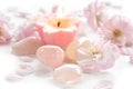 Pink flowers and gemstone with candle