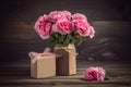 Pink flowers with a gift on wooden table, for mother\'s day. Ai generative