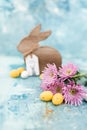 Pink flowers and yellow and white colored easter eggs, and easter bunny Royalty Free Stock Photo