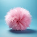 Pink fluffy ball on a blue background. 3d rendering toned image. Royalty Free Stock Photo