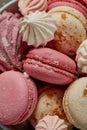 Pink french macaroons with fluffy zephyr