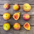 Pink fresh figs on the old wooden table