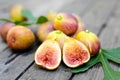 Pink fresh figs on the old wooden table