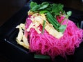 Pink fried noodles with sliced omelette on the top. Thai food Royalty Free Stock Photo