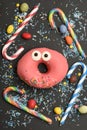Pink funny surprised donut
