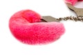 Pink fur handcuffs isolated Royalty Free Stock Photo