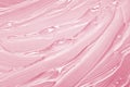 Pink gel texture. Cosmetic clear liquid cream smudge. Transparent skin care product sample closeup Royalty Free Stock Photo