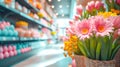 Pink Gerbera Flowers in Shopping Mall. Vibrant pink gerbera flowers in a mall with a soft-focus background