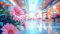 Pink Gerbera Flowers in Shopping Mall. Vibrant pink gerbera flowers in a mall with a soft-focus background