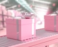 Pink gift box on conveyor roller Royalty Free Stock Photo