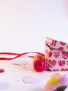 Pink Gift Box Pattern with Heart Shape. Background with white space. Royalty Free Stock Photo