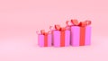 Pink gift box with red ribbon on pink background Royalty Free Stock Photo