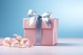 Pink gift box with ribbon bow and flower on blue background, Mothers day and Valentine present promotion offer concept. Generative Royalty Free Stock Photo