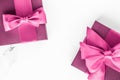 Pink gift box with silk bow on marble background, girl baby shower present and glamour fashion gift for luxury beauty brand, Royalty Free Stock Photo