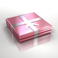 a pink gift box with silver ribbon on a white surface Royalty Free Stock Photo