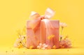 Pink gift box tied with silk ribbon with bow tender flowers on yellow background. Holiday presents shopping celebration concept