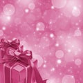 Pink gift boxes on glitter background