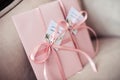 Pink gift certificate, envelope tied with a ribbon. Wedding invitation cards Royalty Free Stock Photo