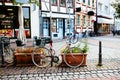 Pink girlish bike parked on the street