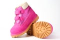 Pink girls nubuck boots isolated on white. Children shoes with velcro fasteners