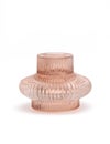 Pink glass candlesticks holder with a corrugated surface isolated on white Royalty Free Stock Photo