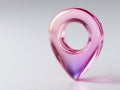 A pink glass heart shaped object on a gray surface Royalty Free Stock Photo