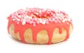 A pink glazed donut with colorful mice on top Royalty Free Stock Photo