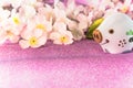 Pink glitter background with sakura cherry blossoms for japanese