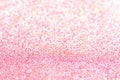 Pink glitter background with selective focus