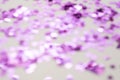 Pink glitter background unfocused. Abstract heart shaped purple sparkling glitter. Christmas, holidays Royalty Free Stock Photo