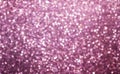 Pink glittery bright shimmering background use as a design backdrop.