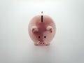 Pink piggy bank on white background, top view. 3d rendering. Royalty Free Stock Photo