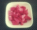 A pink glossy ripe watermelon pieces in a bowl Royalty Free Stock Photo