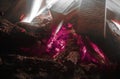 pink glowing burning charcoal, atmospheric outdoor fireplace fire