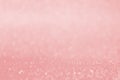 Pink glowing shimmer bokeh background with blur for elegance rich luxury holiday design.