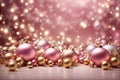 Pink and gold christmas gifts isolated on pastel pink background. christmas ornaments and baubles Royalty Free Stock Photo