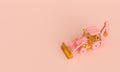 Pink and gold digger on a pink background