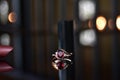 Pink gold ring Adorned with rubies is a beautiful and expensive ring, placed on a reflective