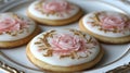 Pink and Gold Rose Cookies on White Plate Royalty Free Stock Photo