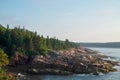 Pink Granite slabs line the rugged shoreline in Maine