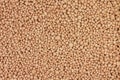 Pink granules mineral fertilizers background