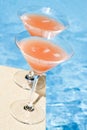 Pink Grapefruit Cocktail by the Pool Royalty Free Stock Photo